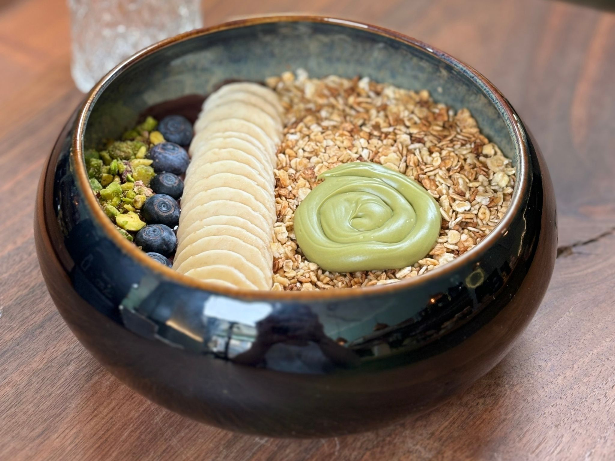 Colorful açaí bowl with fresh fruit toppings and granola